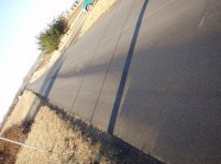 oil slick on road.JPG